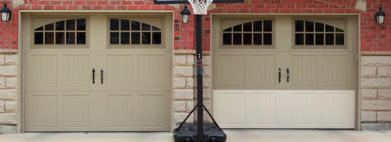 House with a Two Door Garage and a Basketball Hoop